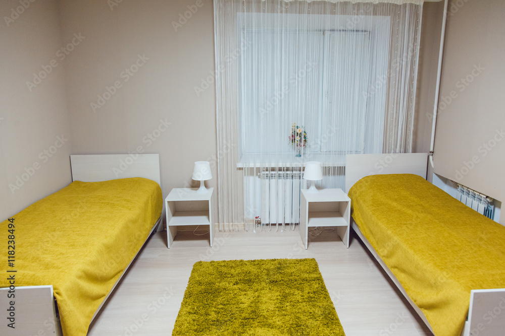 Hostel interior - bedroom. double bed. interior - obrazy, fototapety, plakaty 