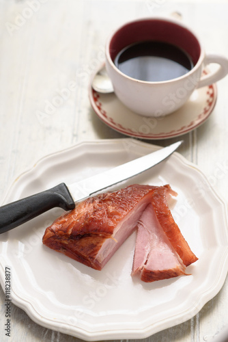 Slice ham and a cup of coffee