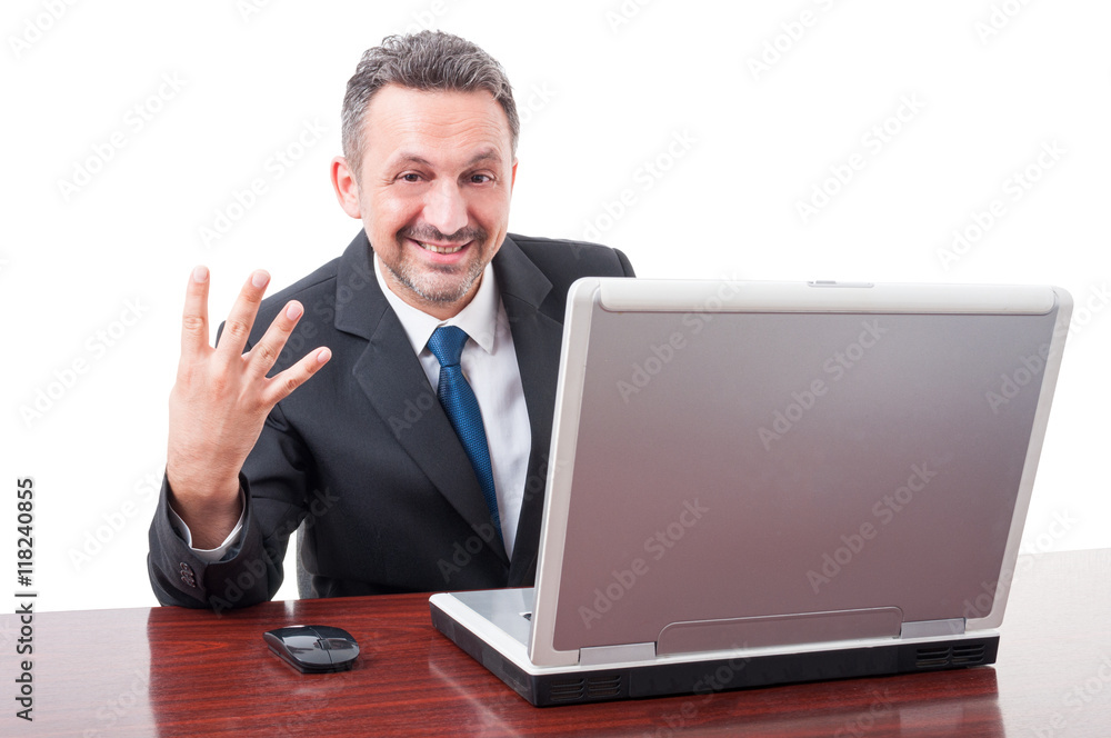 Friendly director on office showing four fingers Friendly director on office showing four fingers