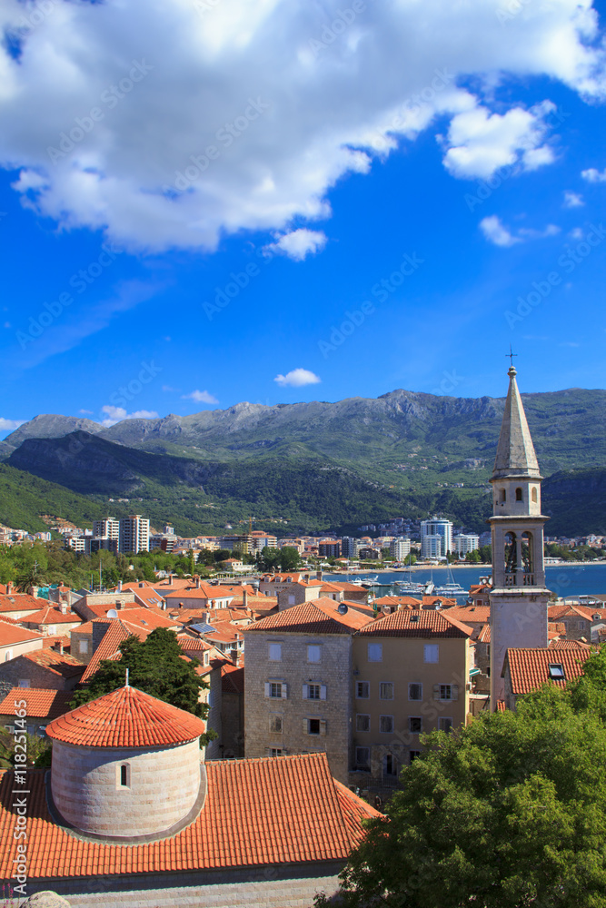 View of the rooftops and the bay of Budva in Montenegro in the summer sunny day