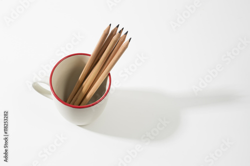 Wood pencil in coffee mug