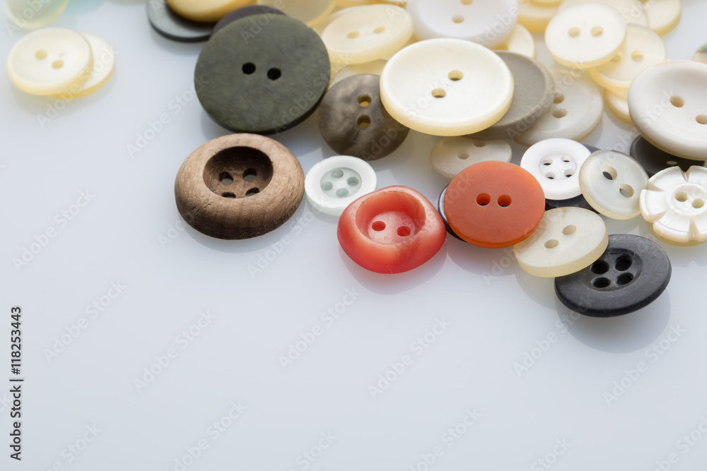 Pile of sewing buttons isolated on white Pile of sewing buttons isolated on white