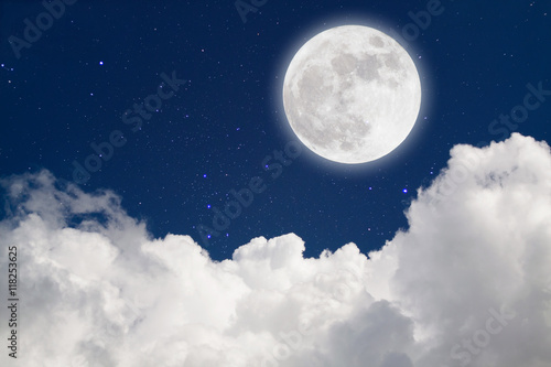 Romantic Moon In Starry Night Over Clouds.