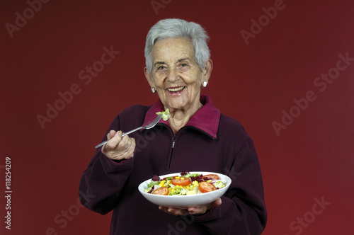 Senir woman with salad