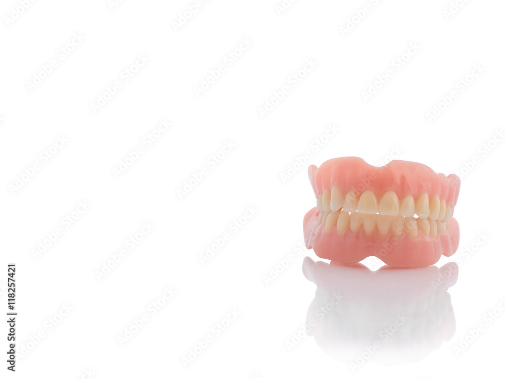 plastic teeth on isolate white background. plastic teeth on isolate white background.