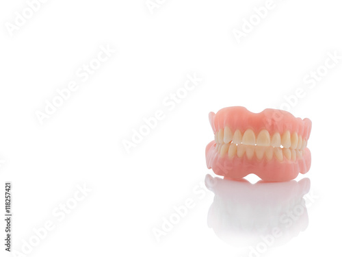 plastic teeth on isolate white background.