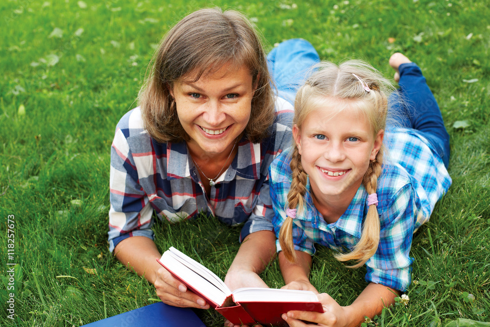 Parent and child reading books together Parent and child reading books together