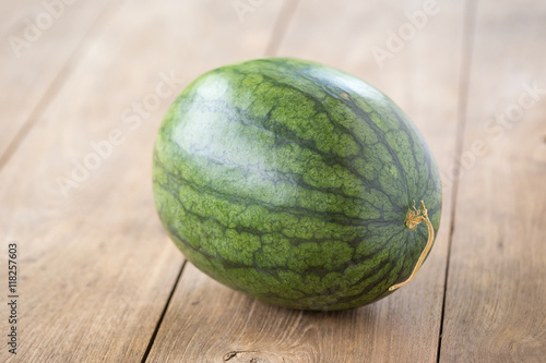 watermelon on brown wooden background