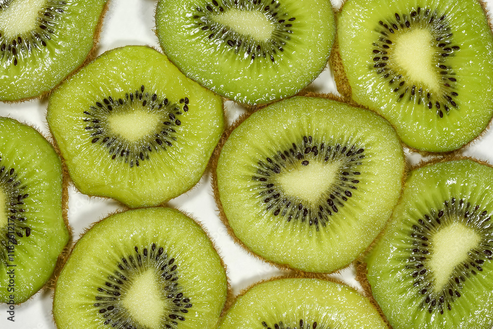 Close up top view macro kiwi fruit slices for background Close up top view macro kiwi fruit slices for background