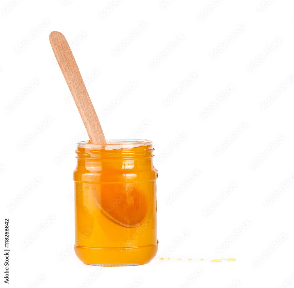 Jar of honey and honey dipper Jar of honey and honey dipper