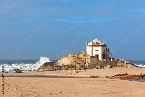 White stone chapel on a Portugal coast