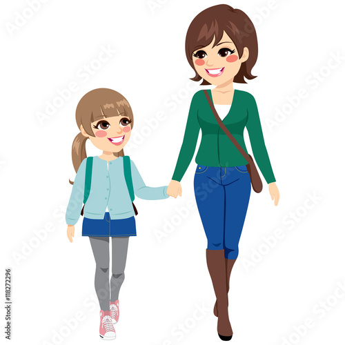 Young mother with her daughter holding hands walking to elementary school