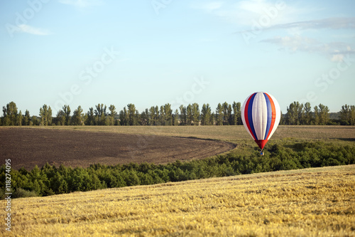 Balloons start fly on fields, hills in summer