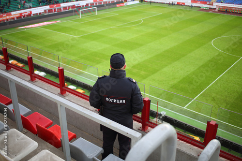 Photography Policeman is standing at grandstand on Locomotive football stadium