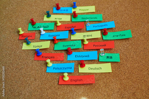 Different language names written on colorful paper notes