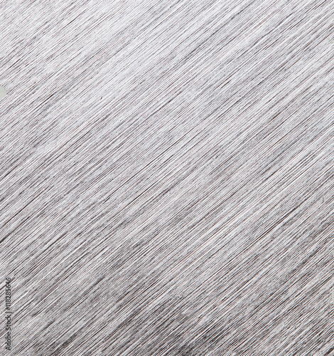 Metal texture background. Macro photo of brushed aluminium. Closeup