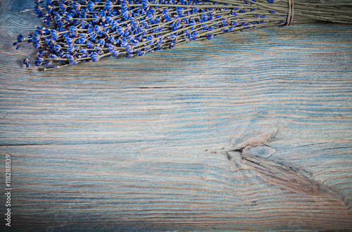 Принти на полотні Sheaf of dry health-giving lavender on wooden board healthcare c