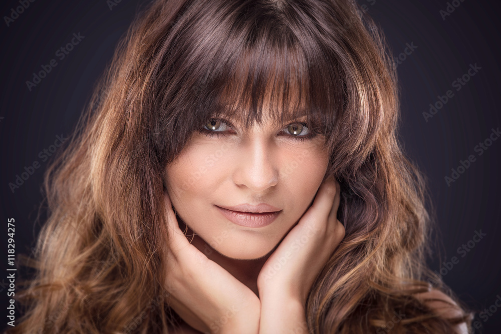 Beauty portrait of natural brunette woman. Beauty portrait of natural brunette woman.