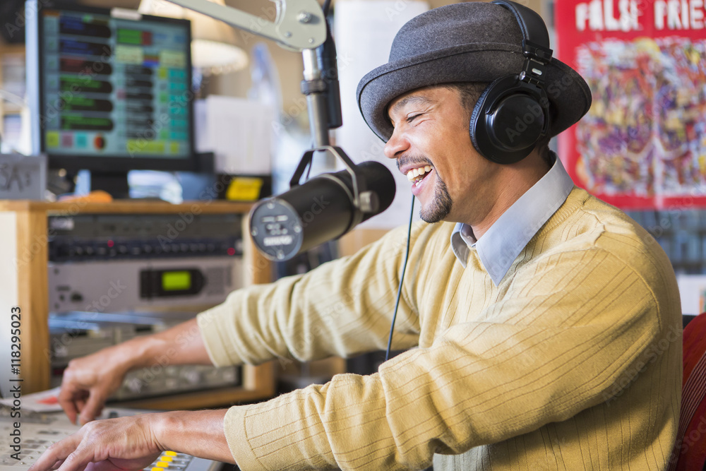 Man using mixing table in studio Man using mixing table in studio