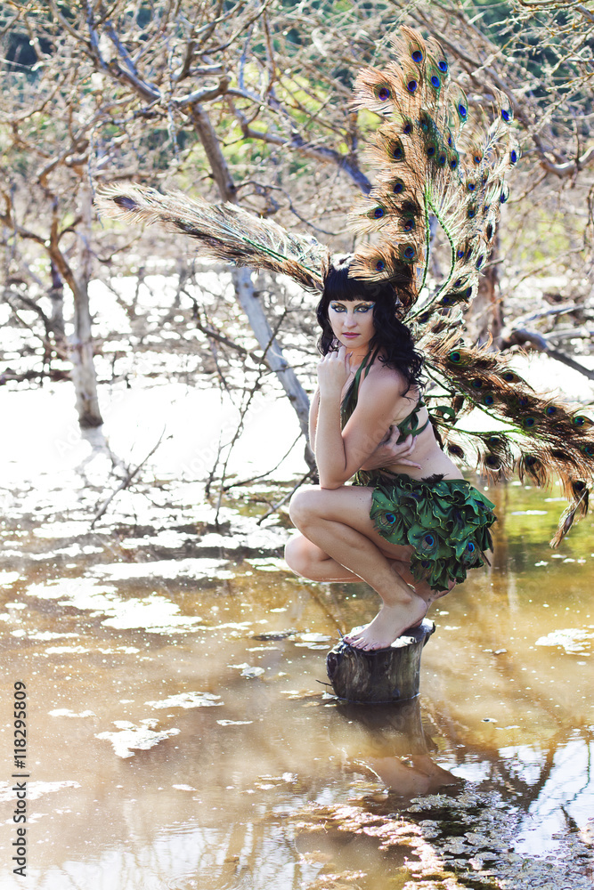 Fototapeta premium girl bird in the Green swamp