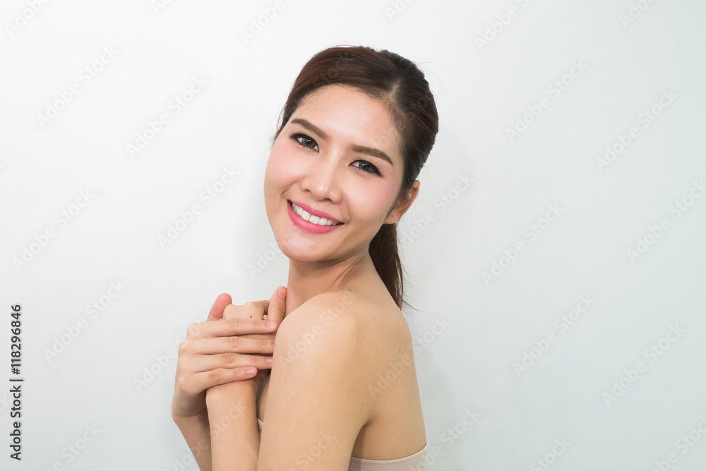 Beauty portrait of young woman with beautiful healthy face, stud