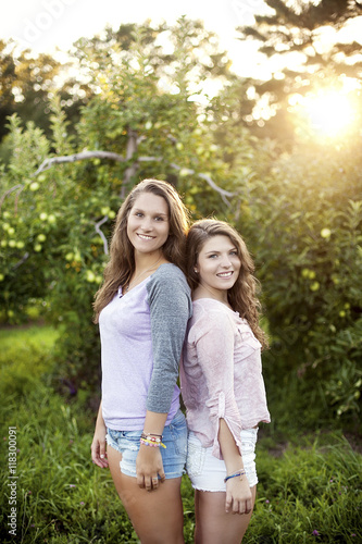 Caucasian women smiling in rural field photo