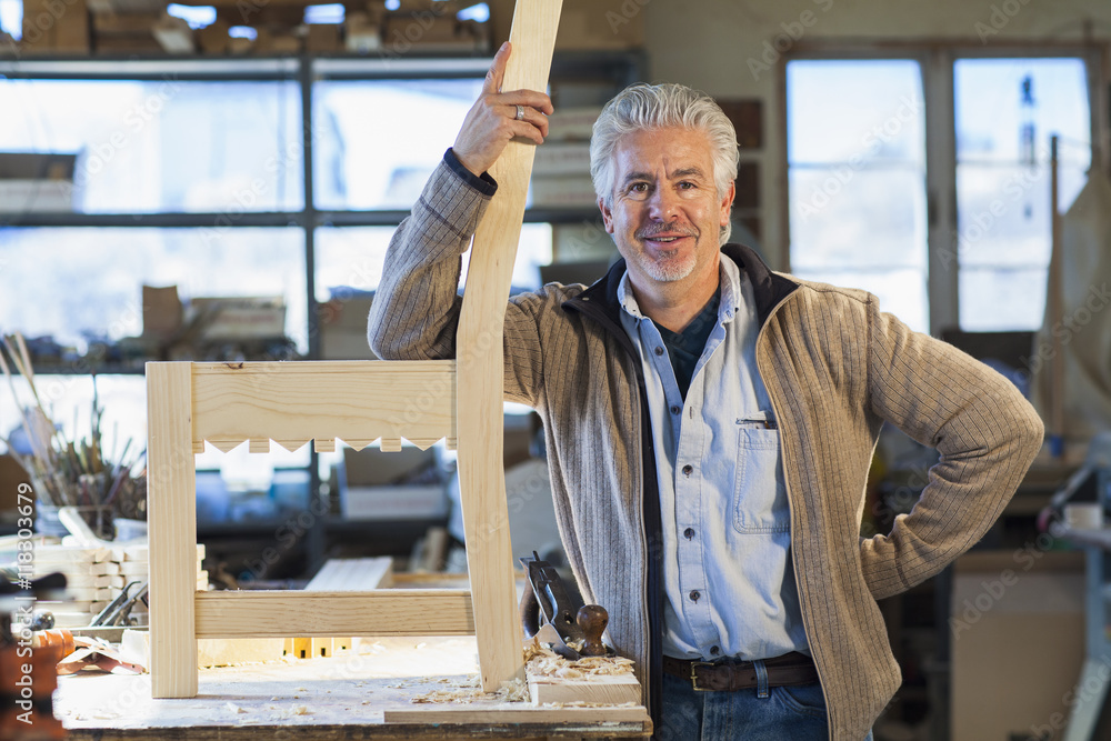 Hispanic craftsman standing in studio Hispanic craftsman standing in studio