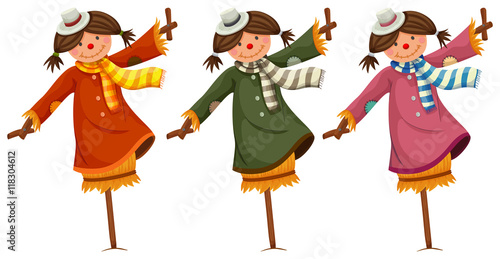 Three scarecrows in woman clothes