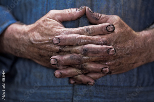 Close up of mechanic's dirty hands