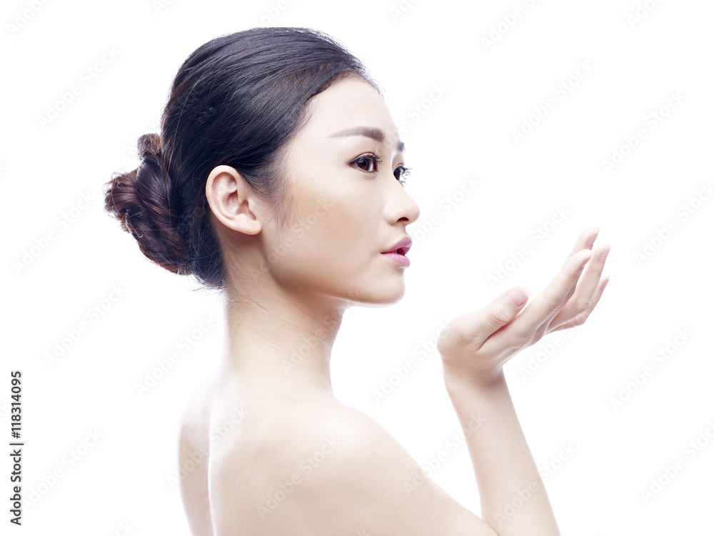 portrait of a young asian model, isolated on white background portrait of a young asian model, isolated on white background