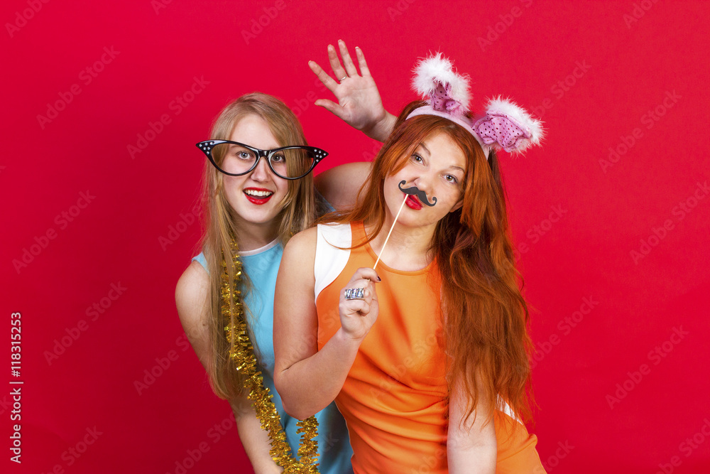 Young nice girls have fun on a christmas party Young nice girls have fun on a christmas party