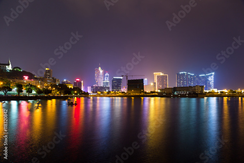 Macau cityscape at night © leungchopan