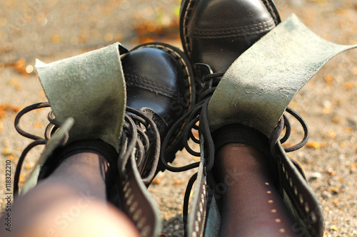 Fotografija unlaced black leather boots