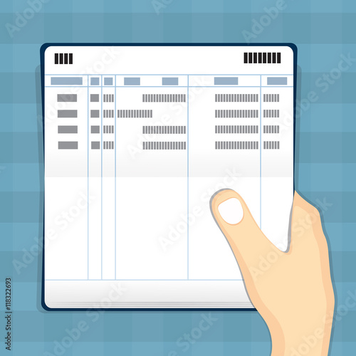 Hand holding passbook .