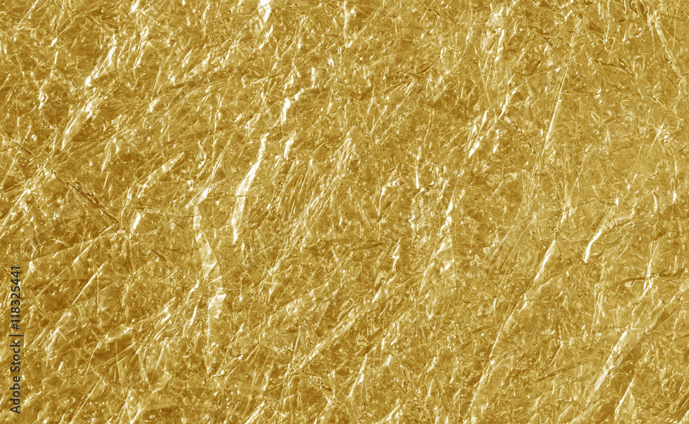 Naklejka premium Shiny yellow leaf gold foil texture