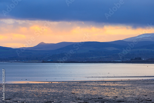 Landscape of mountain at Cromarty Firth during Sunset in Invergordon © bomboman