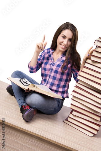 Young student preparing to the college exams isolated on white