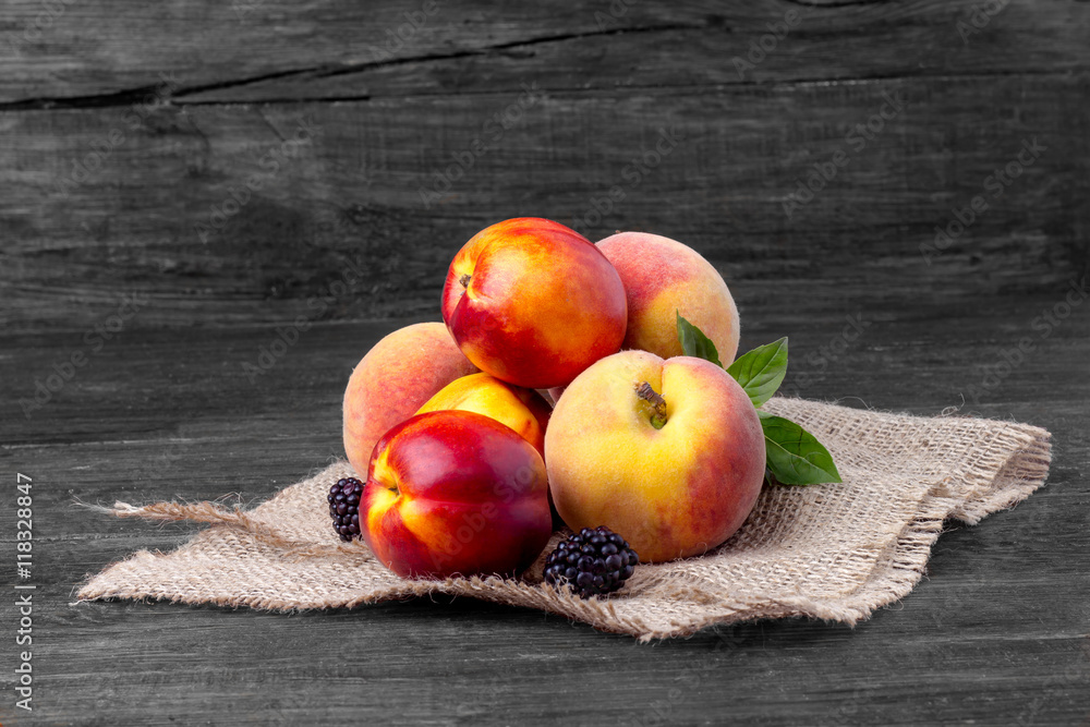 peaches on a wooden table peaches on a wooden table