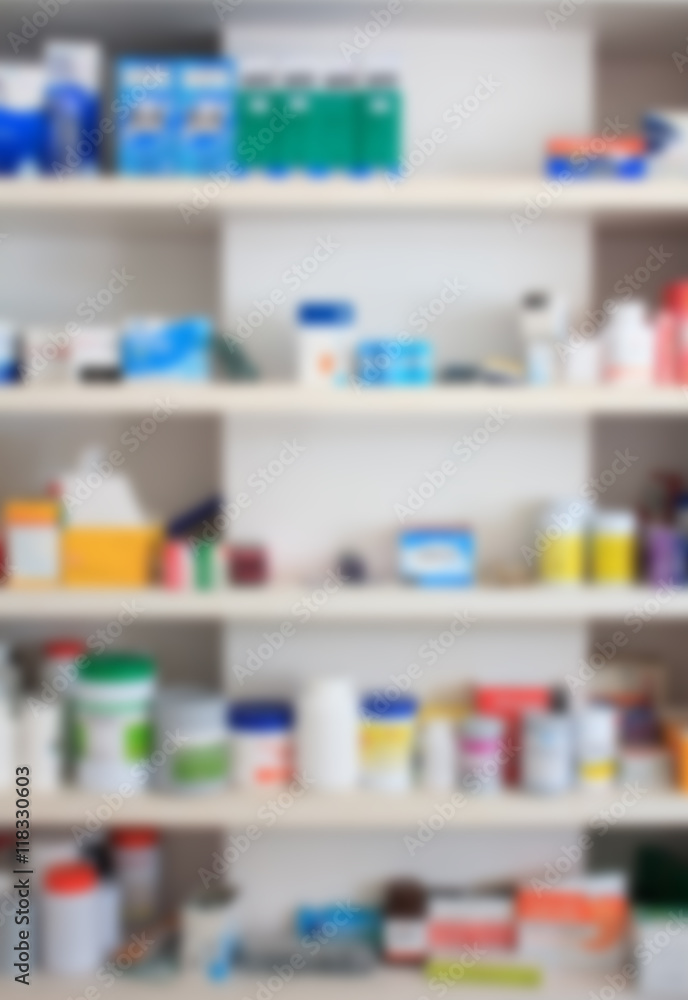 close up blur shelves of drugs in the pharmacy