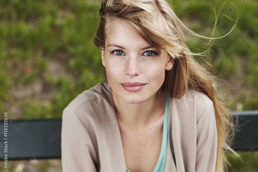 Blue eyed young woman in portrait, close up Blue eyed young woman in portrait, close up