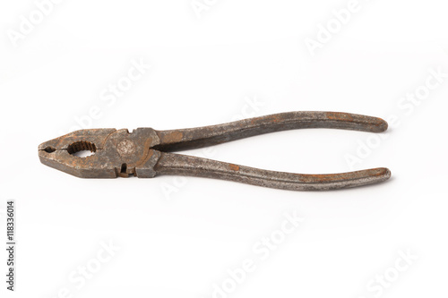 Old rusty pliers on a white background