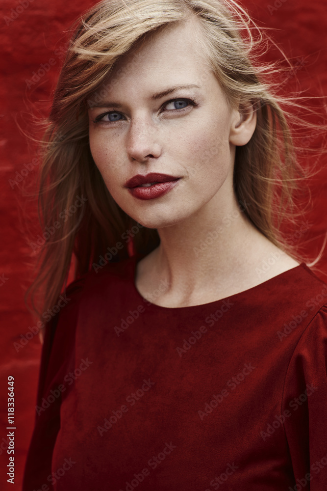 Beautiful blue eyed lady in red, close up Beautiful blue eyed lady in red, close up
