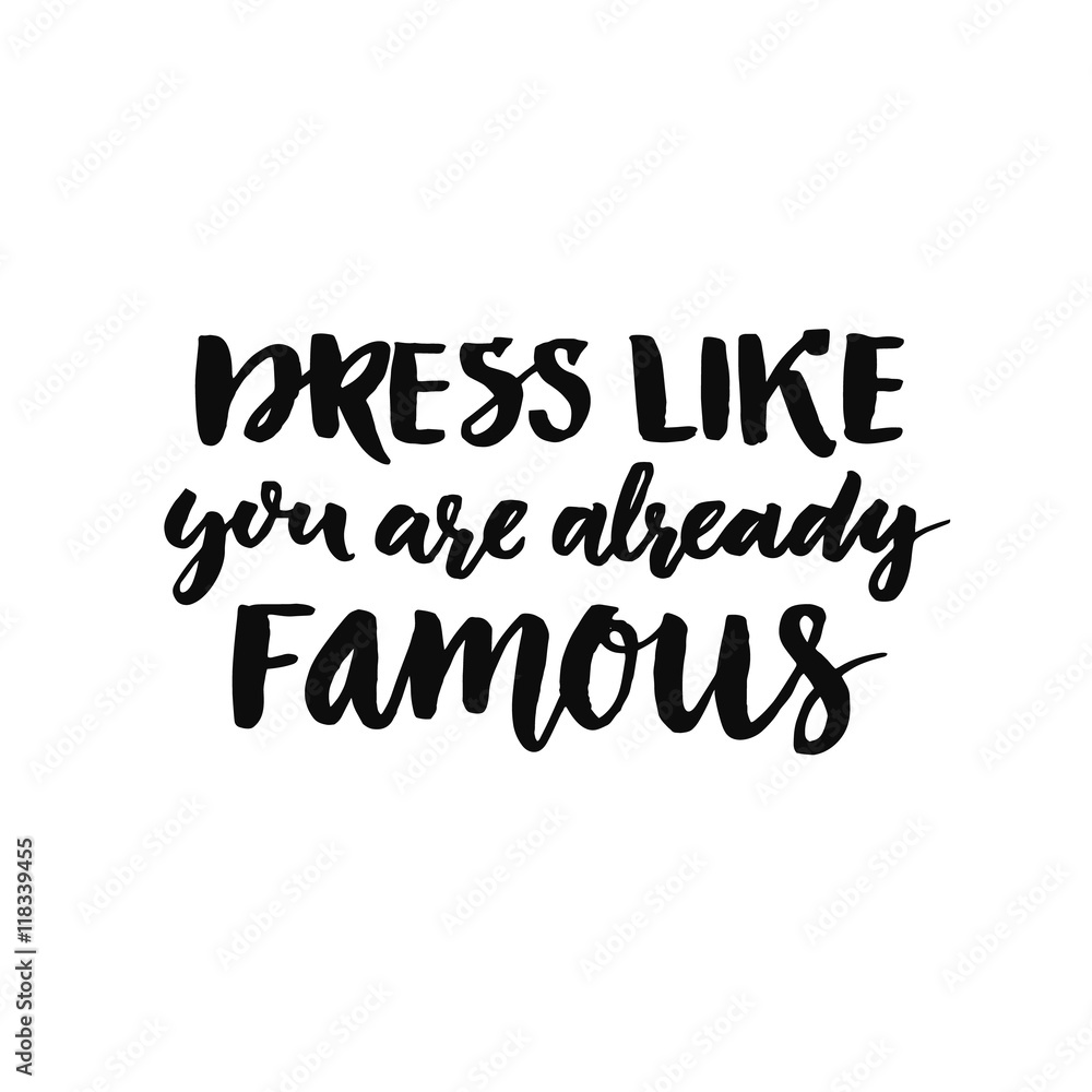 Dress like you are already famous. Motivation slogan about clothes, fashion, self-esteem. Brush lettering with black ink isolated on white background