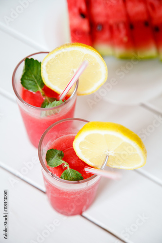 watermelon juice on wooden background. Selective focus