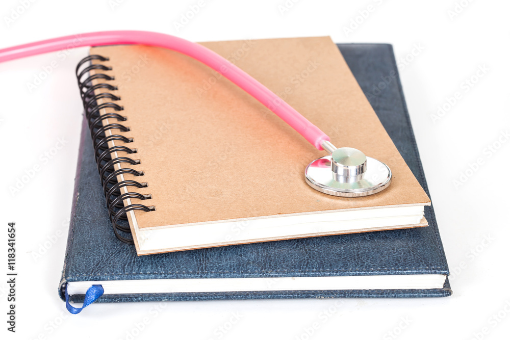 Diary and stethoscope isolated on white background Diary and stethoscope isolated on white background