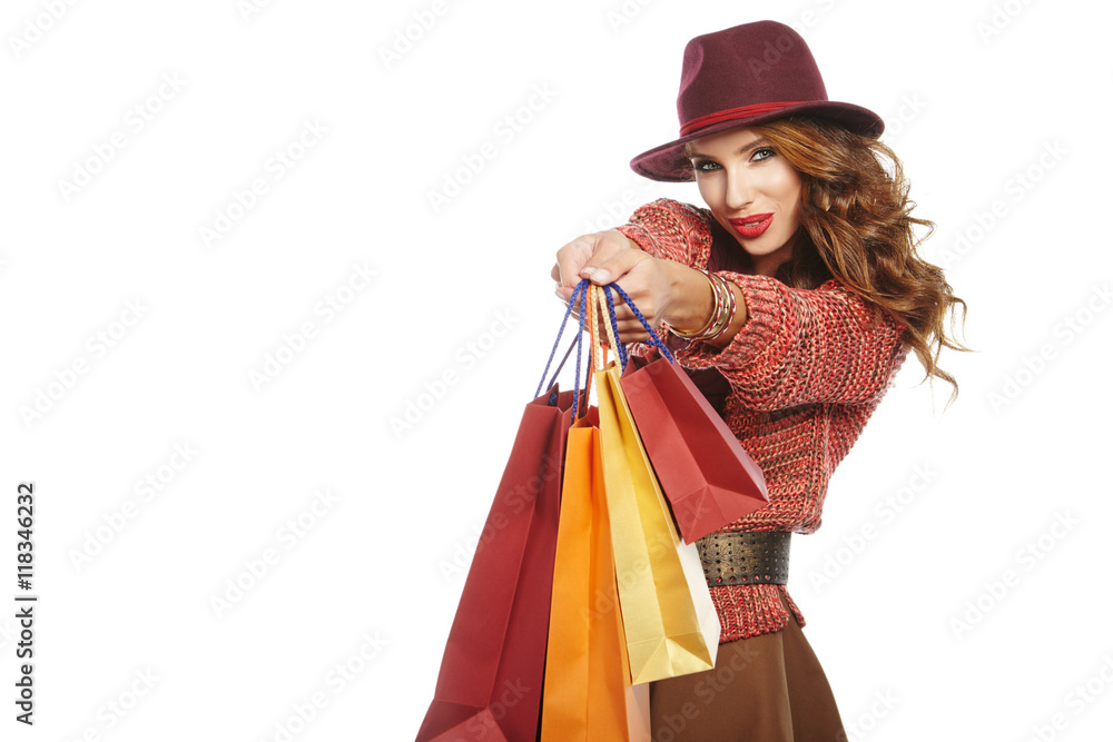 Autumn woman with shopping bags. Studio shoot Autumn woman with shopping bags. Studio shoot