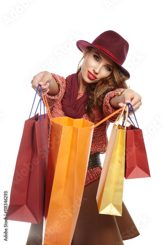 Autumn woman with shopping bags. Studio shoot