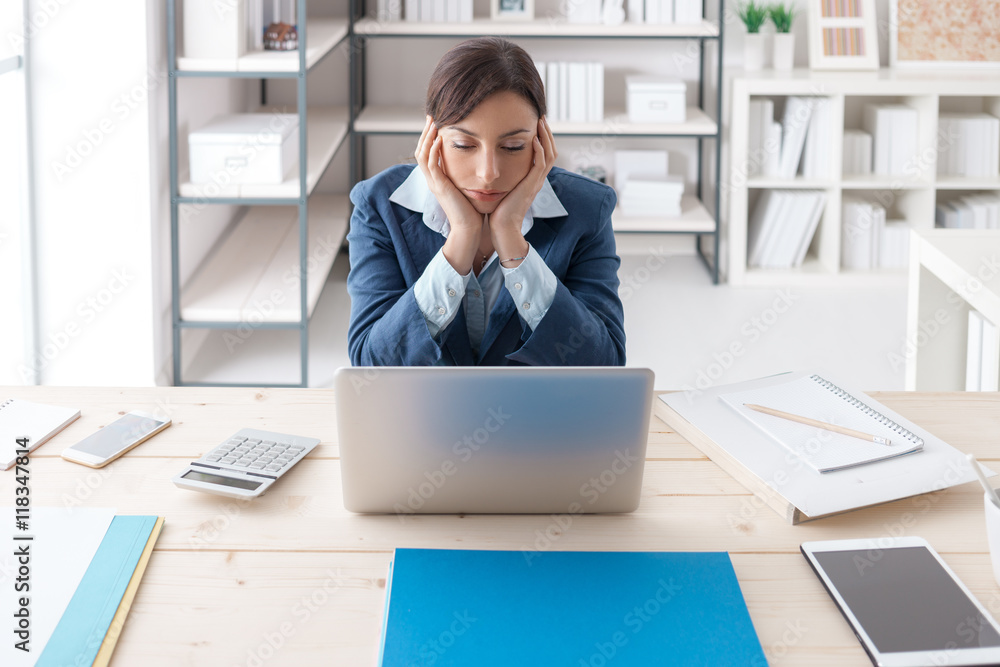 © stokkete - Bored businesswoman in her office © stokkete - Bored businesswoman in her office