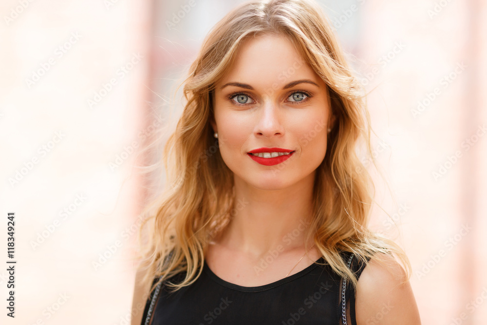 Closeup portrait of blonde woman with grey eyes, natural makeup Closeup portrait of blonde woman with grey eyes, natural makeup