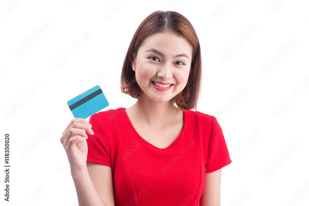 Beautiful friendly smiling asian girl showing credit card in han Beautiful friendly smiling asian girl showing credit card in han